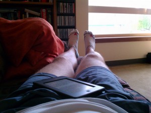 Relaxing and reading after my 10 km run.