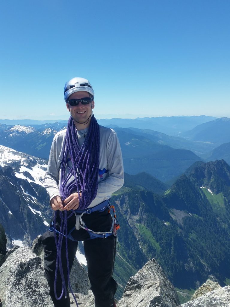 Coiling our glacier rope on the summit of Eldorado Peak.