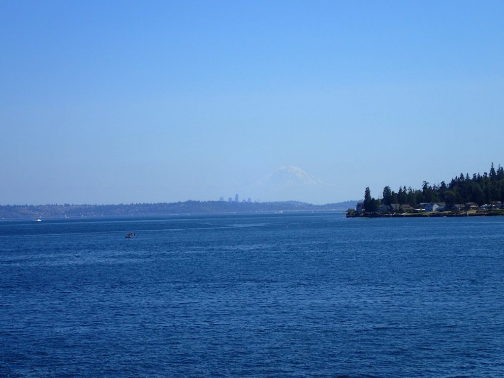 On the ferry to Edmonds. Mount Rainier dwarves Seattle.