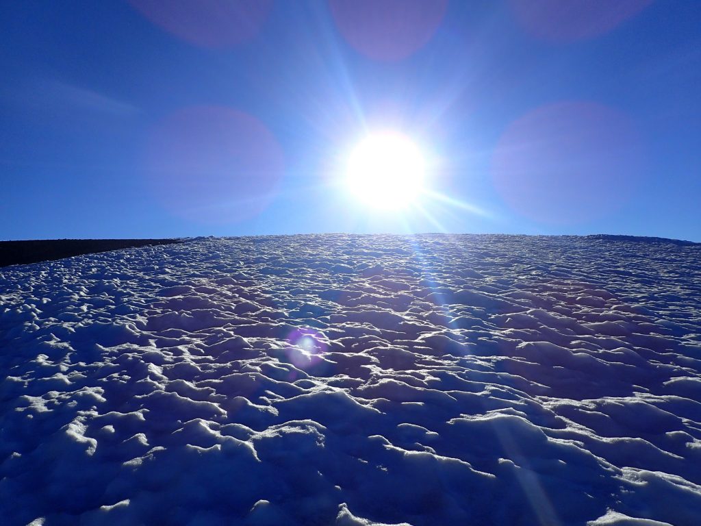 Sun above Pikers Peak.