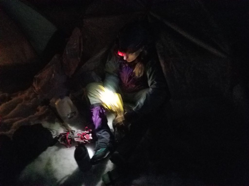 Jenny putting on her gaiters and crampons just before midnight.